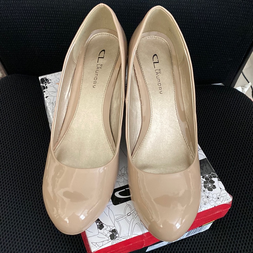 Patent Nude. Worn once. No scratches. Great condition.
